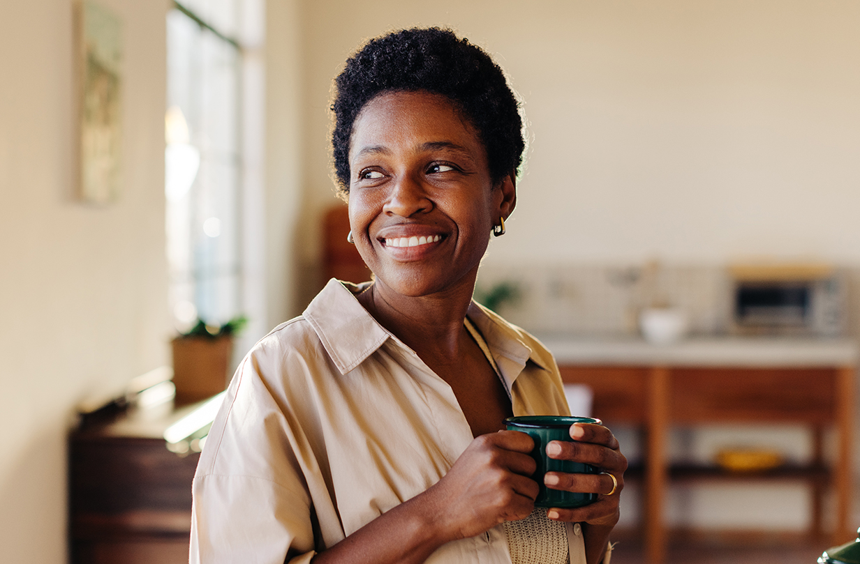 Mature Brazilian woman enjoying morning cafézinho at home Mature Brazilian woman enjoying morning cafézinho at home